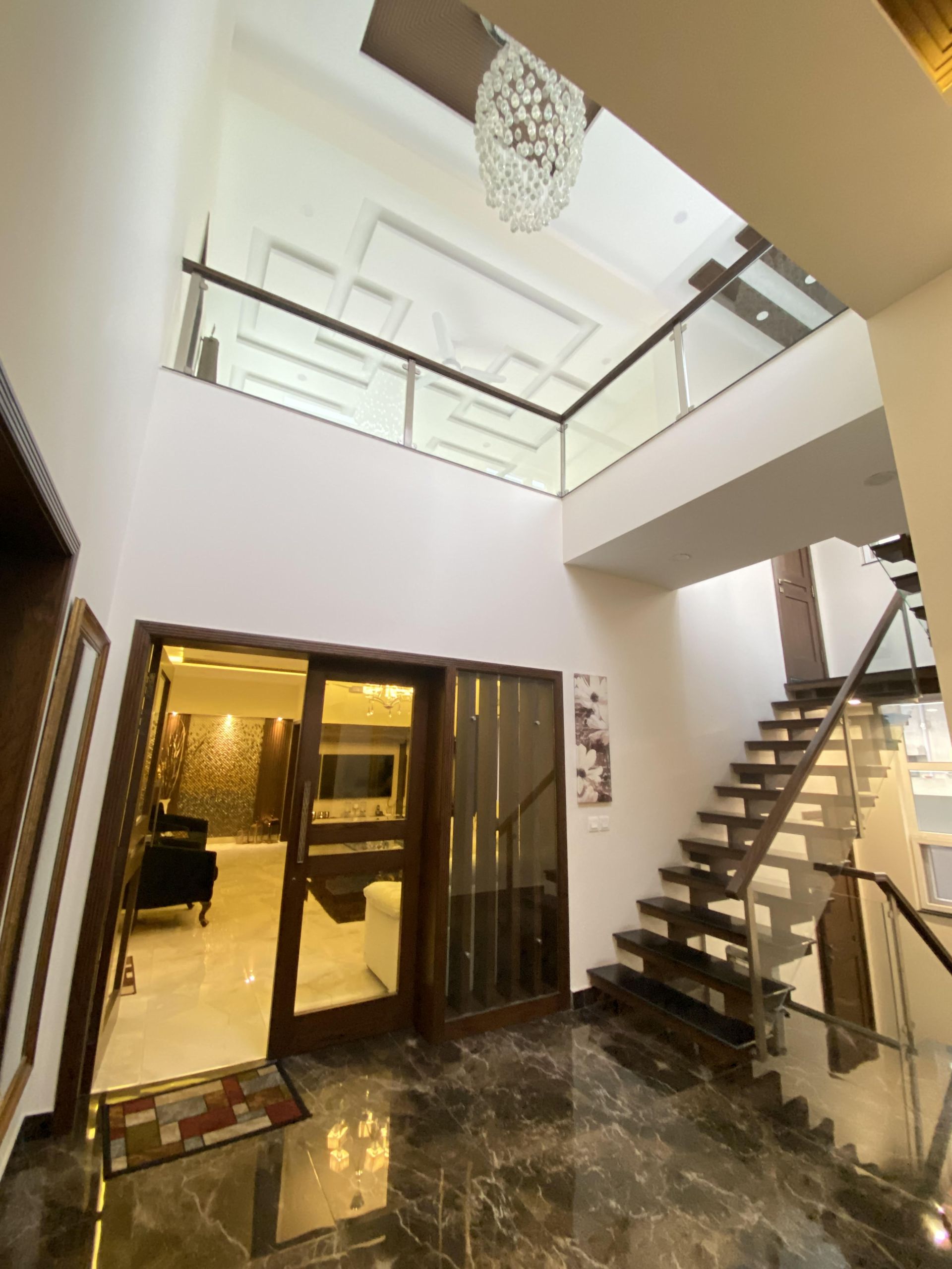 Double-height foyer interior finished by Bunyad Allied